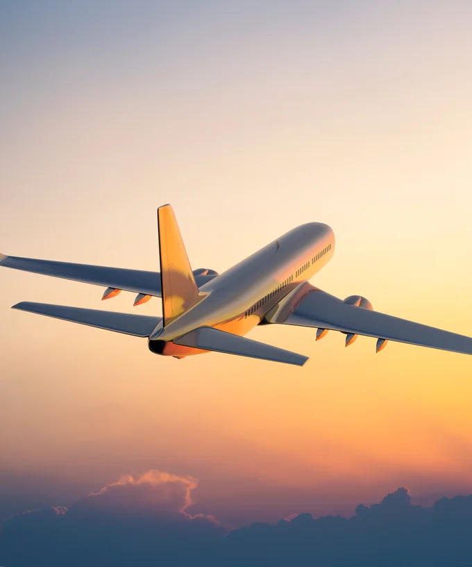 Aircraft in flight at dusk